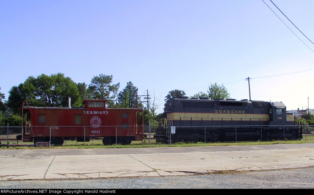 SAL 1114 & caboose sit inside the wye